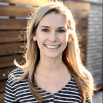 Headshot of Kendall Gassner from shoulders up, smiling with a black and white striped top