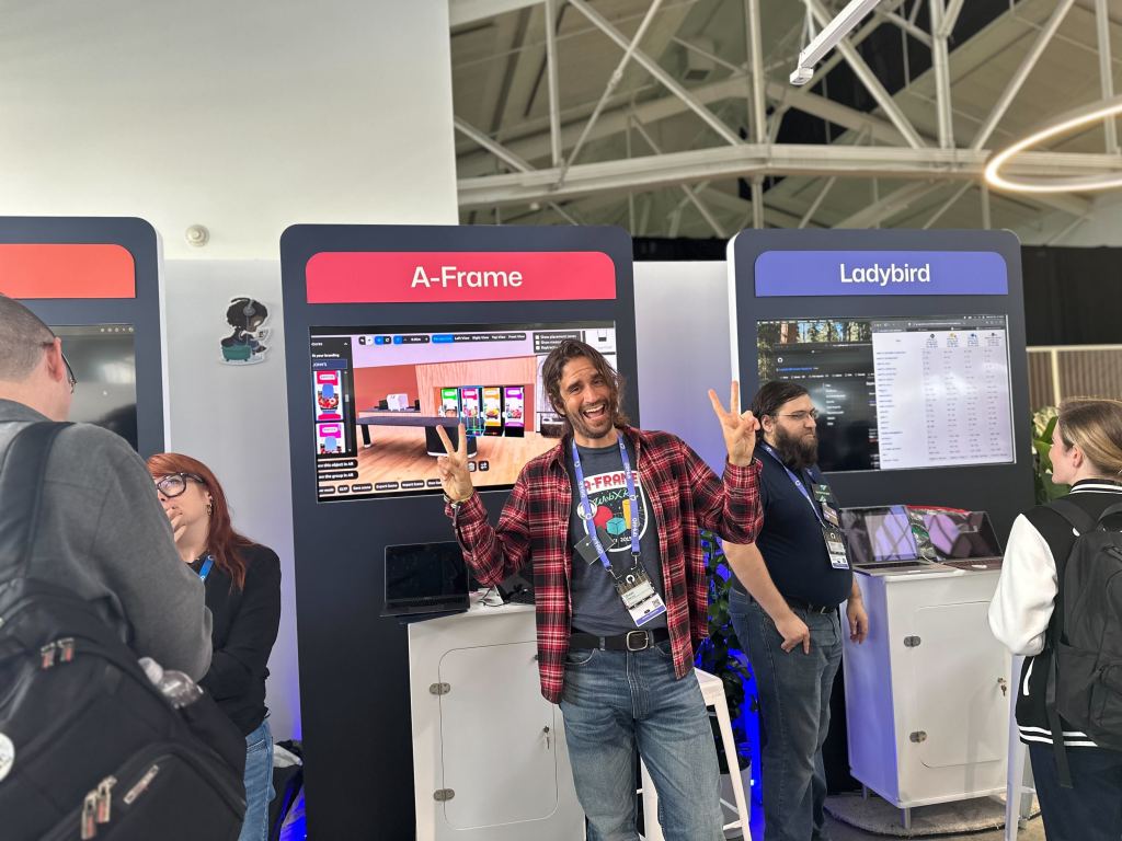 Photograph of @dmarcos casually bending reality with A-Frame in the Open Source Zone last year ✌🏻